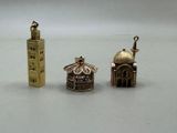three small objects that are sitting on a table