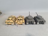 four tanks that are lined up in a row