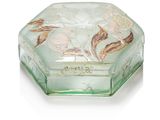 une petite boîte en verre ornée d'un motif floral