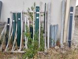 a lot of poles that are leaning against the wall