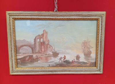 la photo d'un tableau accroché à un mur rouge