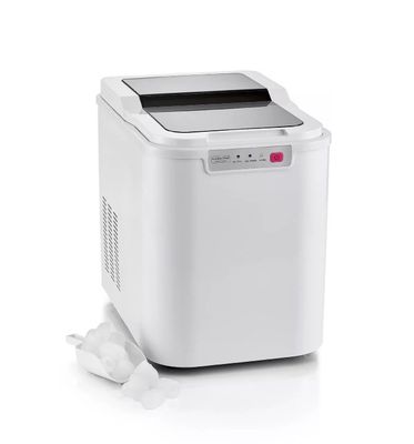 a small white machine sitting on top of a white surface
