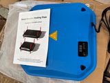 a picture of a blue box with a sign on it