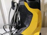 a yellow and black pressurer sitting on a white table