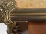 a close up of a table with a clock on top of it