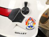 a close up of a motorcycle with a badge on the back of it