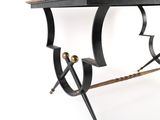 a black table with a wooden top and metal legs