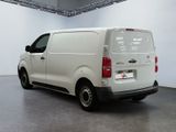 a white van that is parked in a room