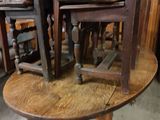 many chairs that are stacked on top of each other