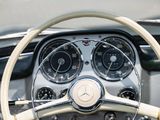a steering wheel and dashboard of a classic car
