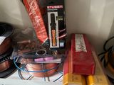 many different types of wires and wires on a shelf
