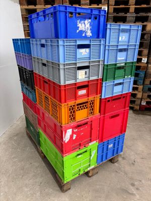 several crates stacked on top of each other in a warehouse