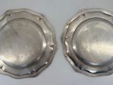 pair of silverplated plates with scalloped rims