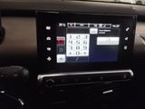 a picture of a car dashboard with a touch screen