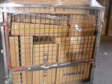 a metal cart with boxes on it in a warehouse