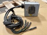 a close up of a box with wires and wires attached to it