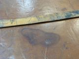 a close up of a piece of metal on a table