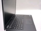 a black laptop with a black keyboard on a white surface
