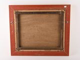 an old picture frame with a piece of wood in it