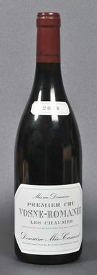 a bottle of wine that is sitting on a table