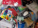a pile of assorted items on the floor of a room