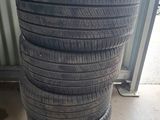 a stack of four tires stacked on top of each other