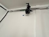 a camera attached to a wall in a room