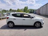 a picture of a white car parked on the side of the road