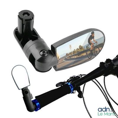 a picture of a rear view mirror and a bicycle handlebar