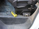 a cell phone sitting in the back seat of a car
