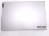 a silver laptop that is sitting on a table