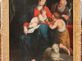 painting of a family with a dog and a cat in a gold frame