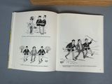 a book with a picture of a group of people playing instruments