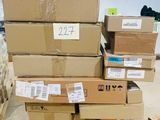 many boxes stacked on top of each other in a warehouse
