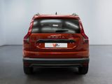 the rear end of a red volvo v - cross parked in a room
