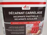 the container is full of cleaners and a red glove on it
