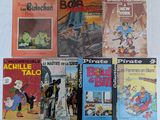un grand nombre de livres posés sur une table