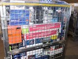 a cart full of sodas and cans in a warehouse
