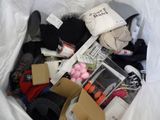 a white bag full of items that are in it