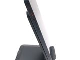 a cell phone that is sitting on a stand