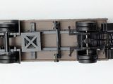 a toy car that is sitting on a white surface