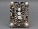 an antique diamond and pearl broochle ring