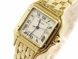 an image of a gold wrist watch with roman numerals on it