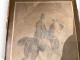 a drawing of a man riding a horse in a box