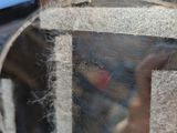 a reflection of a person in a mirror on a table