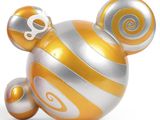 mickey mouse ornament in gold and silver with a white background