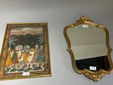 two mirrors on the wall next to each other
