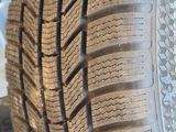 a close up of a tire on a vehicle with a flat tire