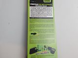 the back of a green package with a black and white label on it