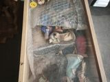 a picture of a doll in a box with a teddy bear in it